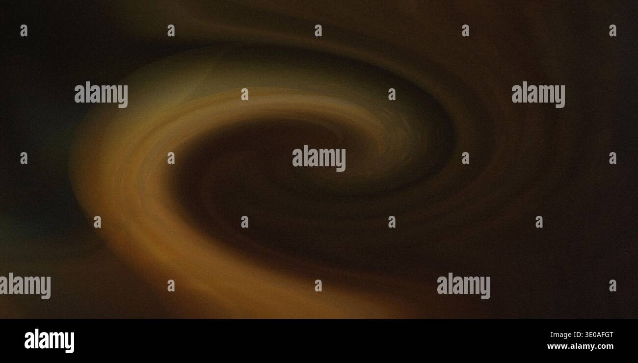 Ein dunkler, unscharfer Hintergrund mit einer markanten, wirbelnden Spiralform in Orange- und Schwarztönen, die einen dynamischen visuellen Effekt erzeugt Stockfoto