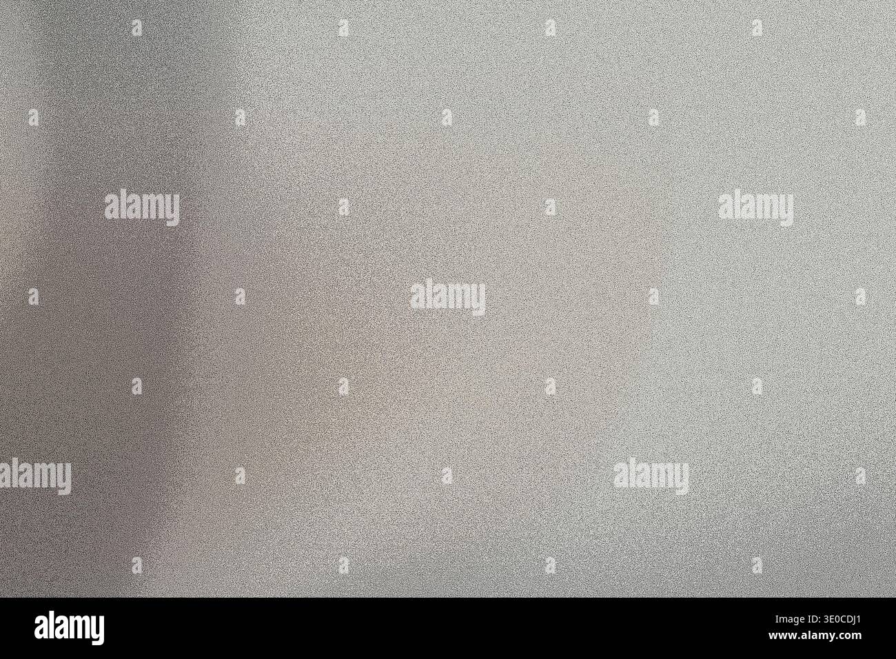 Ein unscharfes Bild zeigt eine hellgraue Oberfläche mit einem leicht strukturierten Aussehen. Der Gesamteindruck ist ein sanfter, gedämpfter Ton und undeutlich Stockfoto