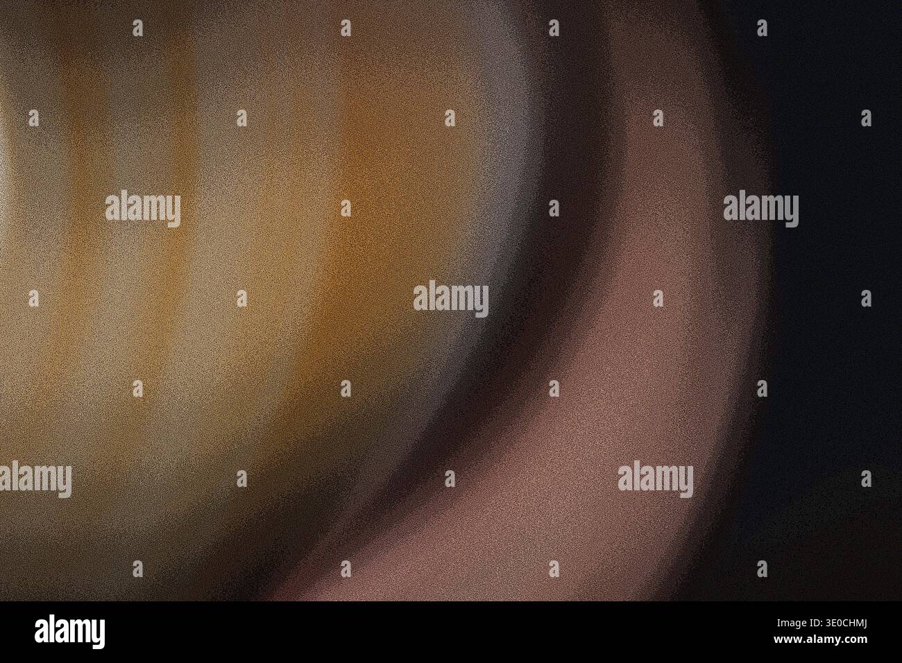Das Bild zeigt eine unscharfe Nahaufnahme eines abgerundeten, goldbraunen Objekts. Die Oberfläche erscheint glatt und möglicherweise leicht reflektierend. Der Hintergrund Stockfoto