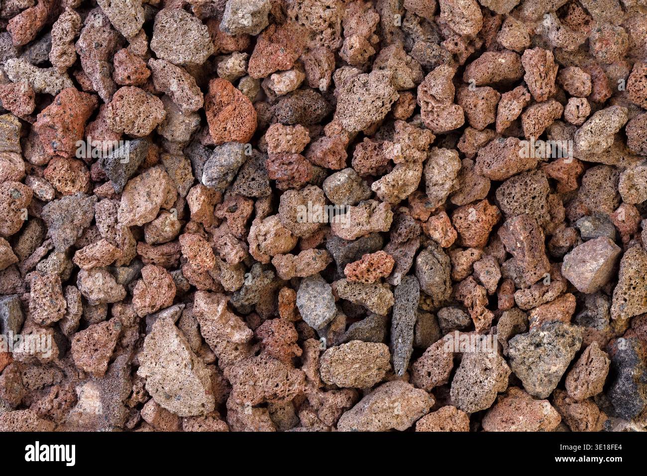 Textur aus vulkanischer Lava-Steinen. Stockfoto