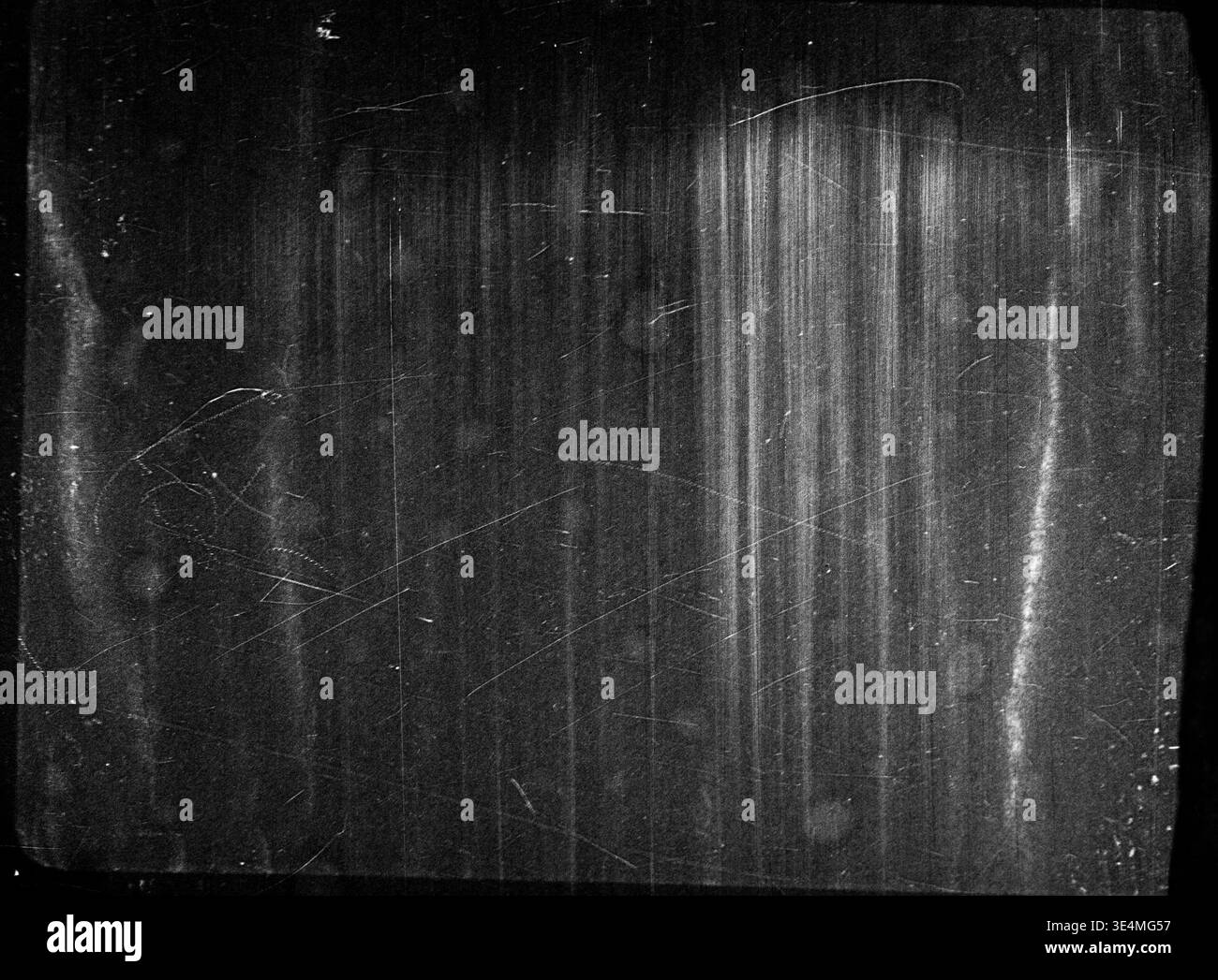 Graue schwarz-weiße Textur mit Kratzern und Körnung Stockfoto