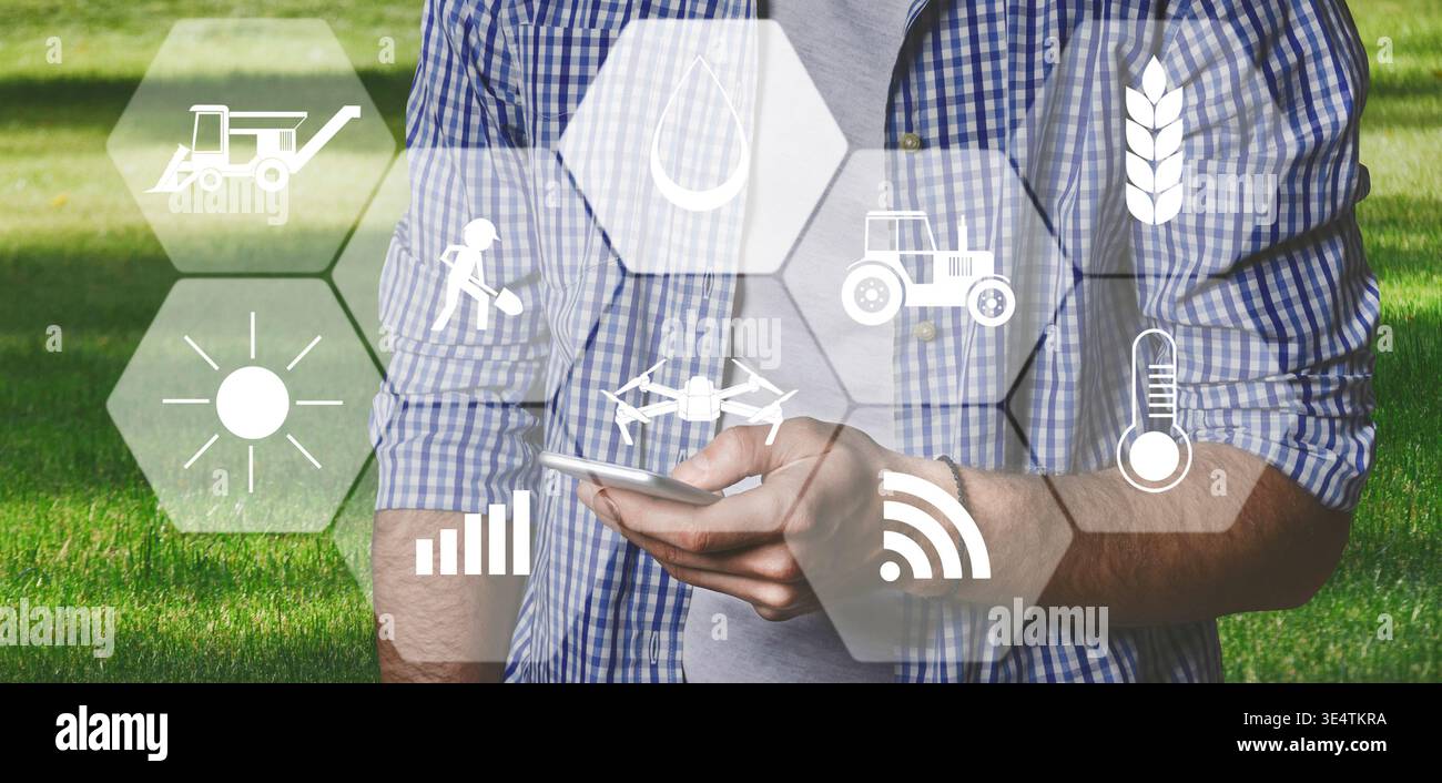 Mann Landwirt mit digitalen Tablette im Feld zur Verwendung von Apps Stockfoto