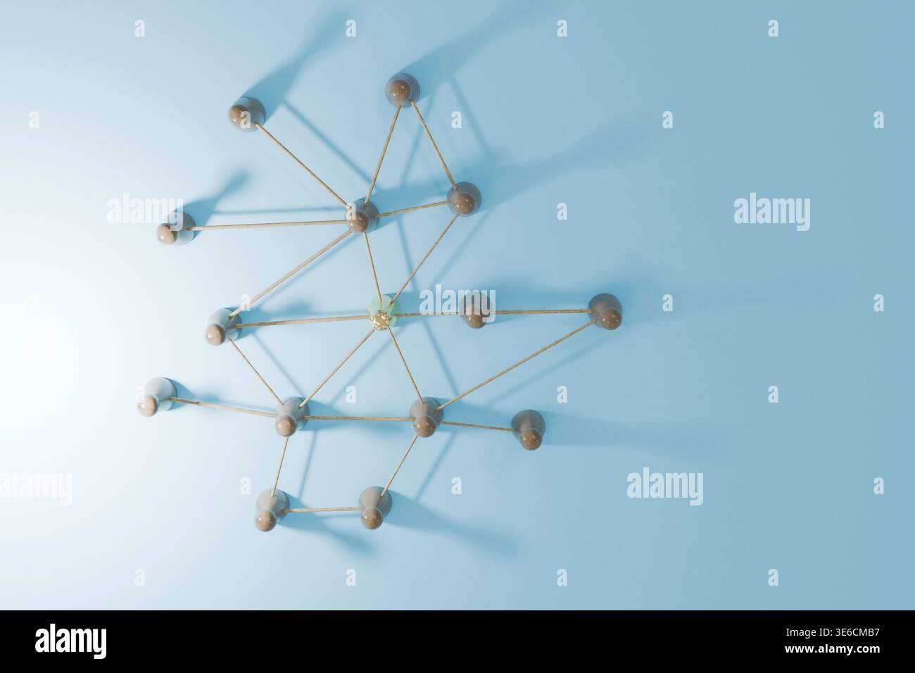 Ein abstraktes Netz von Holzstiften, die durch Streicher auf blauem Hintergrund verbunden sind. Dieses minimalistische Konzept repräsentiert Konnektivität, neuronale Pfade, s Stockfoto
