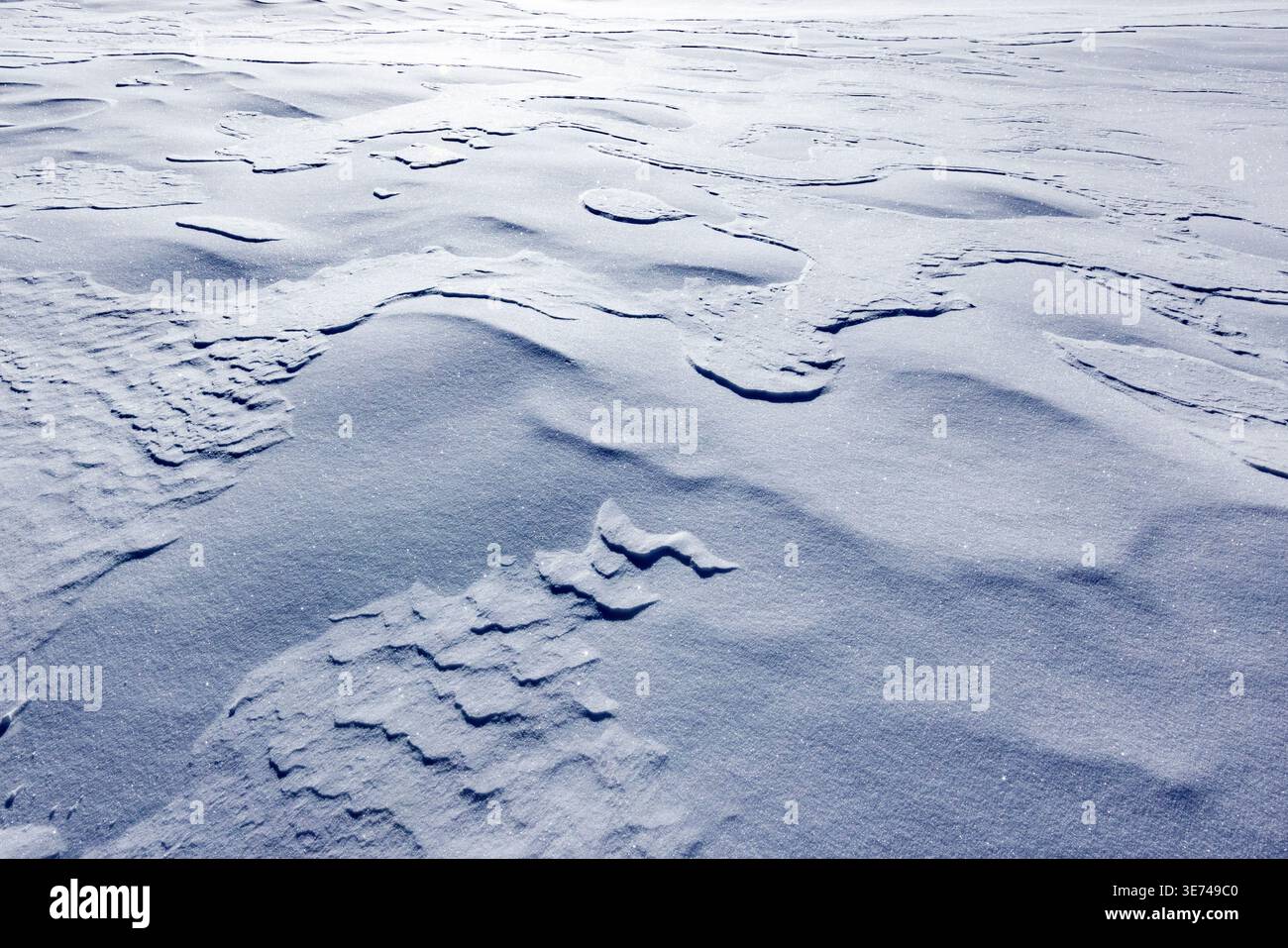 Nahaufnahme der texturierten Schneeoberfläche Stockfoto