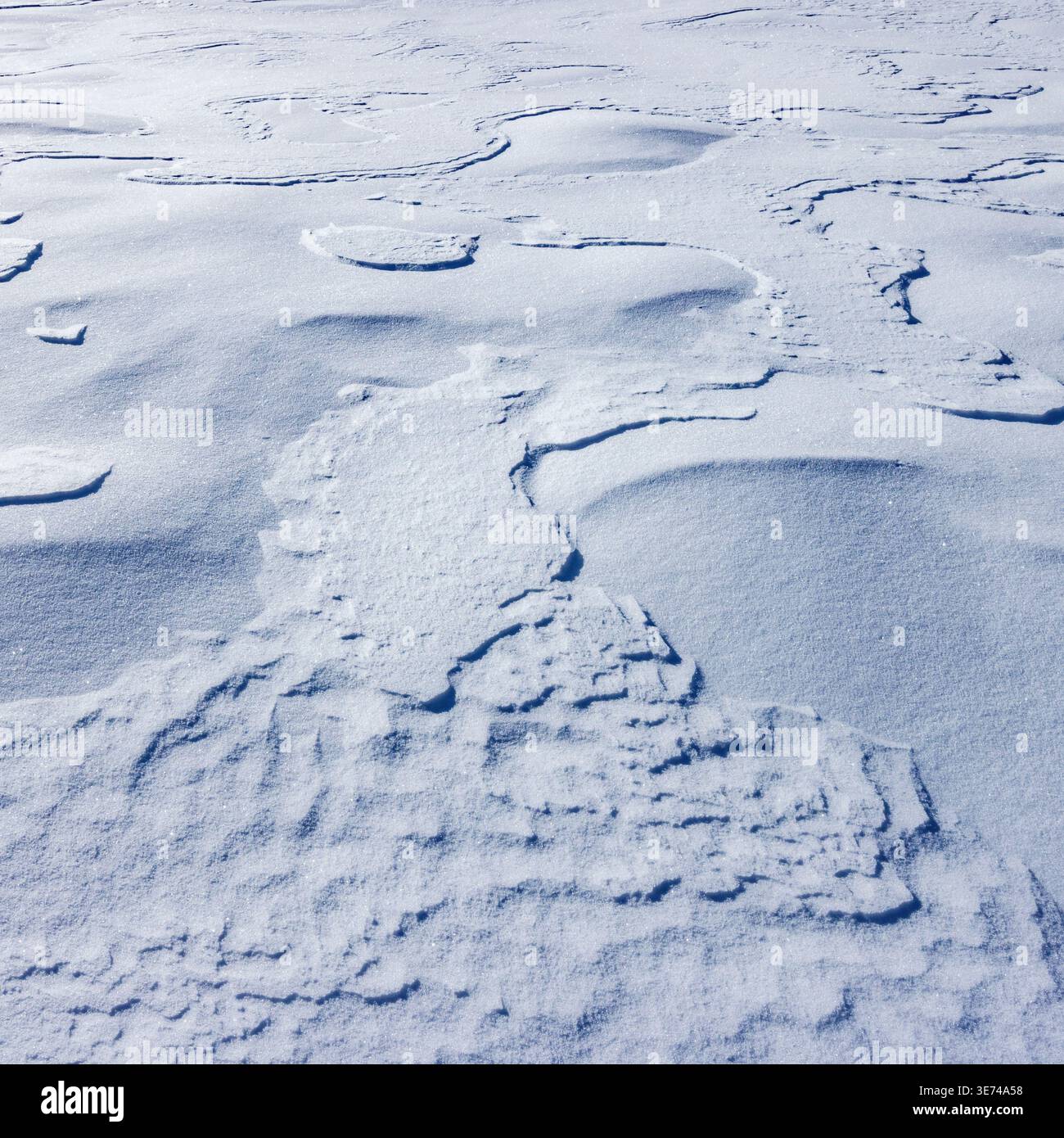Nahaufnahme der texturierten Schneeoberfläche Stockfoto