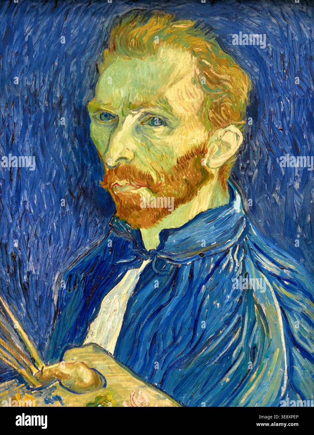 Vincent Van Gogh malt 1889 sein Selbstporträt. Dieses Kunstwerk zeigt sein Gesicht in leuchtenden Farben und seinen einzigartigen Stil. Stockfoto