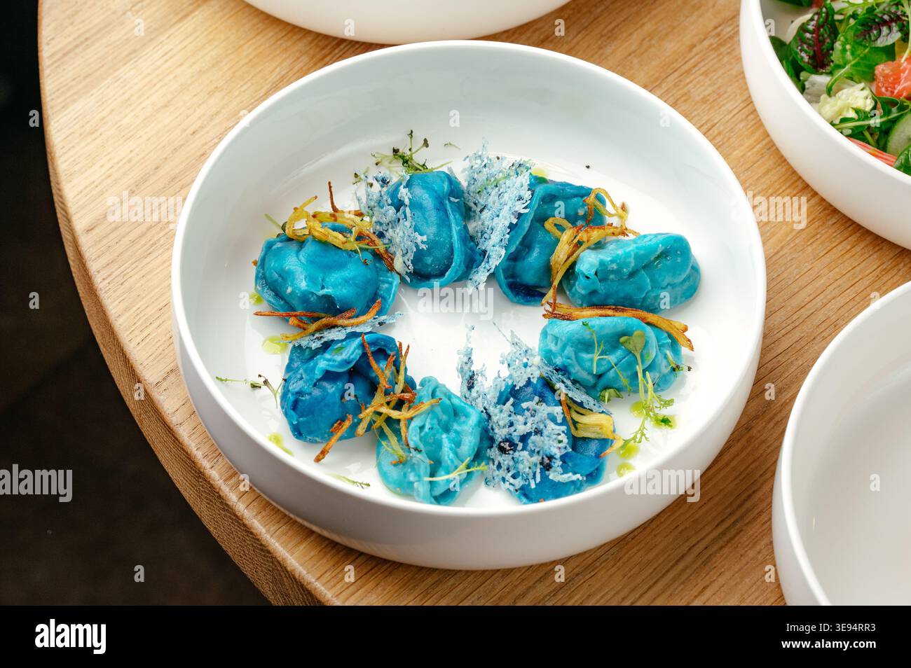 Blauer Gyoza im Vortrag des Autors Stockfoto