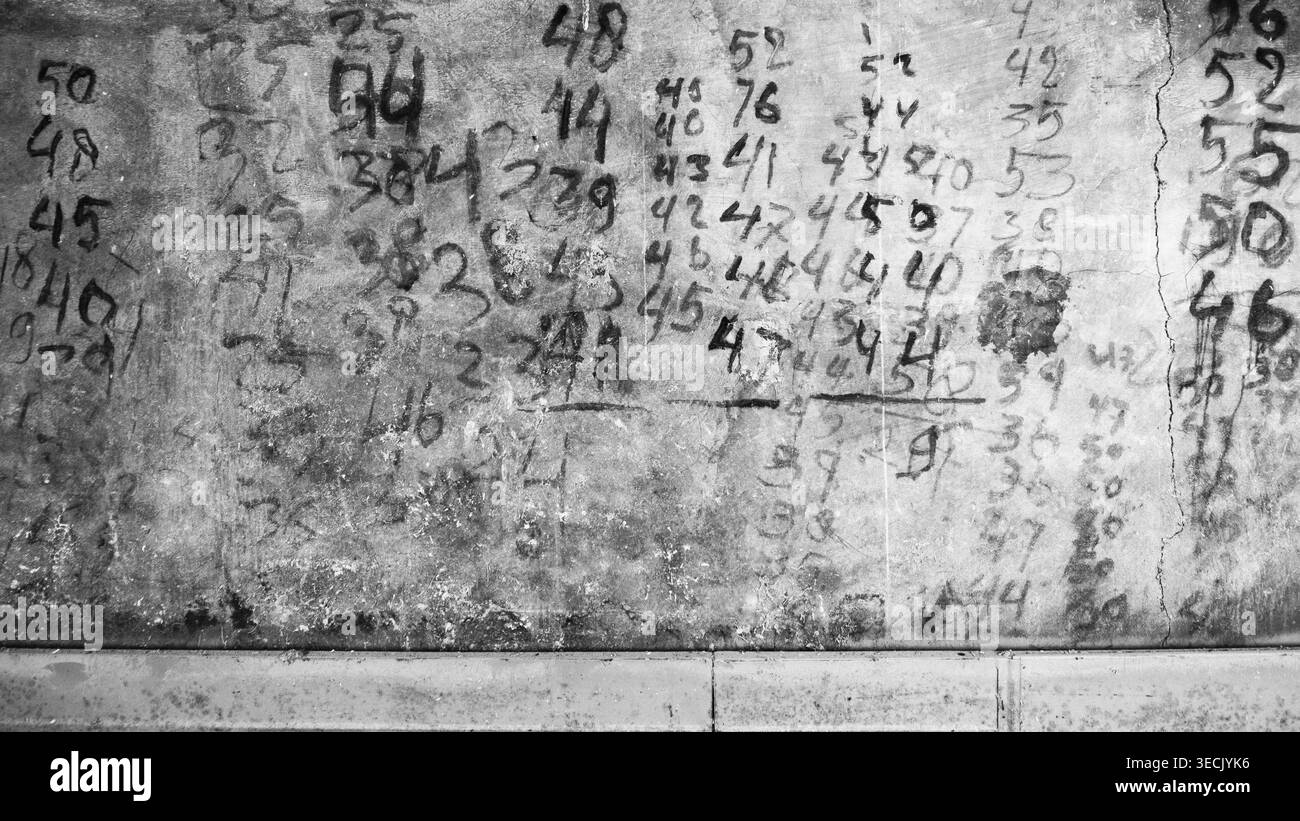 Schriften an der Wand eines alten Lagerhauses Stockfoto