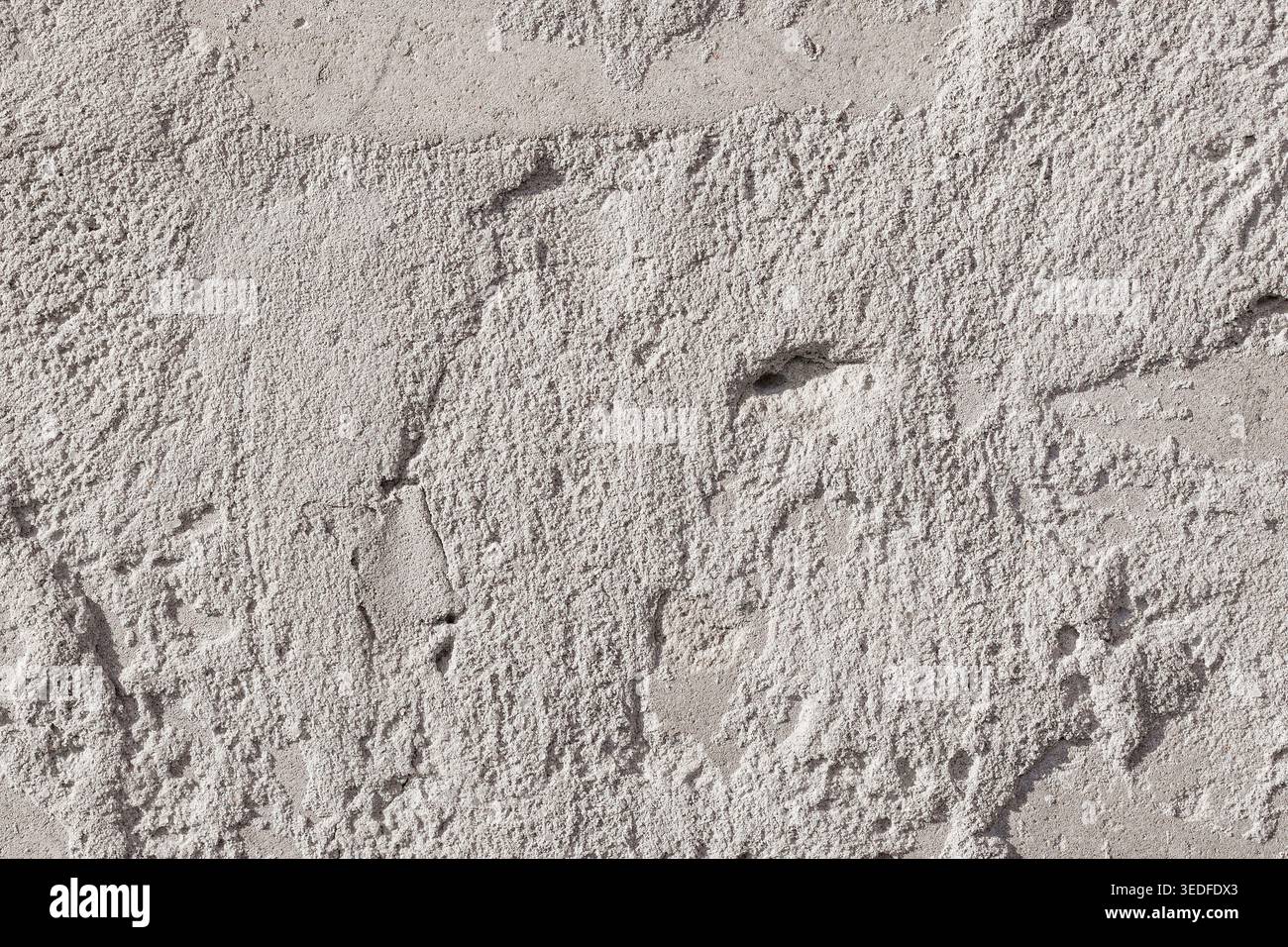 Raue graue Gipsstruktur, Betonwandoberfläche Hintergrund Stockfoto
