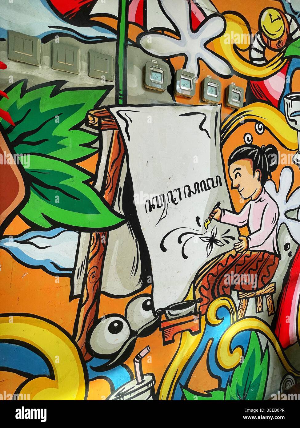 Farbenfrohes Graffiti-Wandgemälde mit fröhlichen Zeichentrickfiguren in traditioneller javanischer Kleidung, die die lokale Kultur und Identität bei einem Solo-9. Mai 2026 zelebrieren Stockfoto