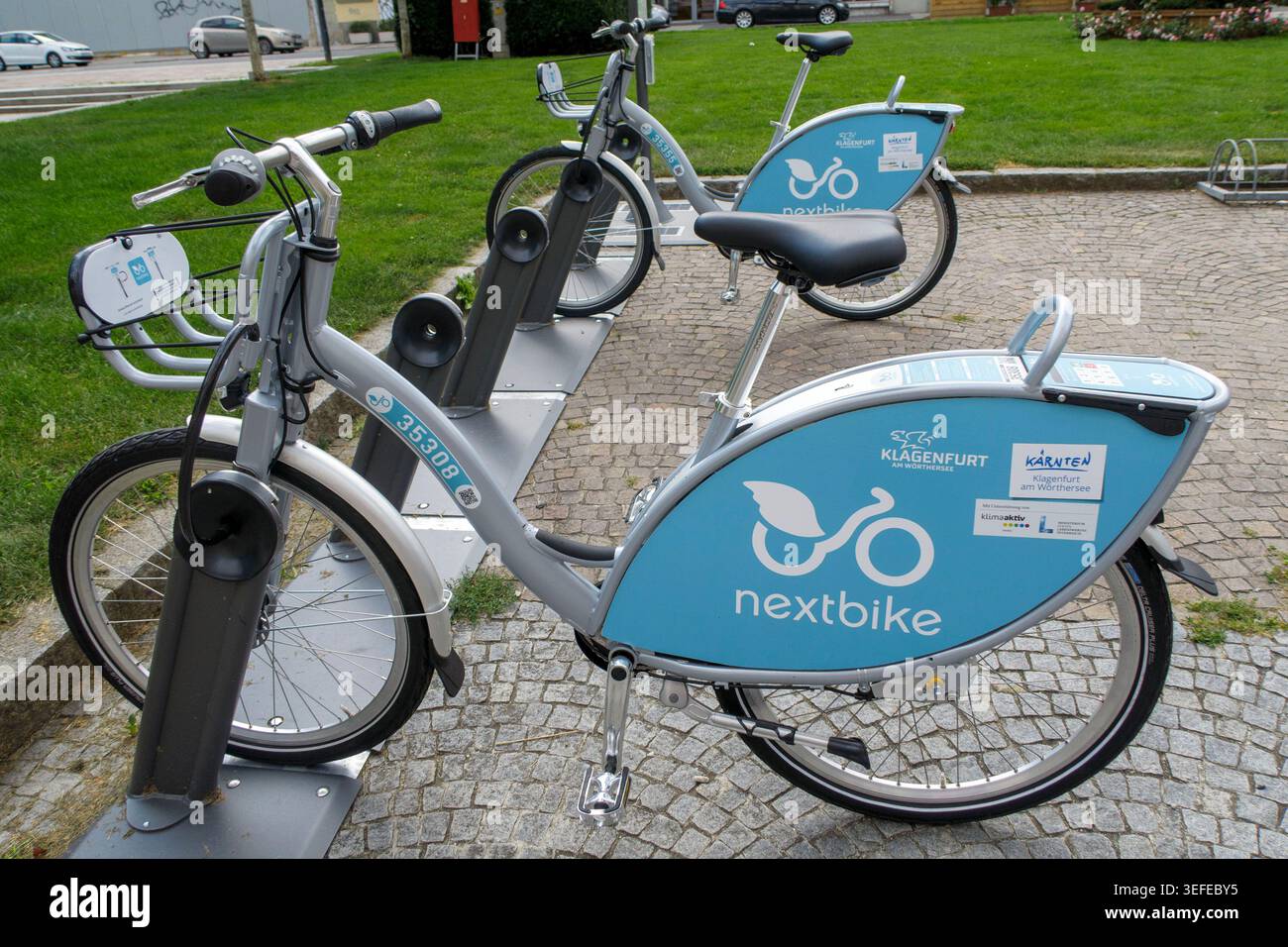 Nextbike-Leihfahrräder parken an einer Dockingstation in Klagenfurt, Kärnten, Österreich Stockfoto