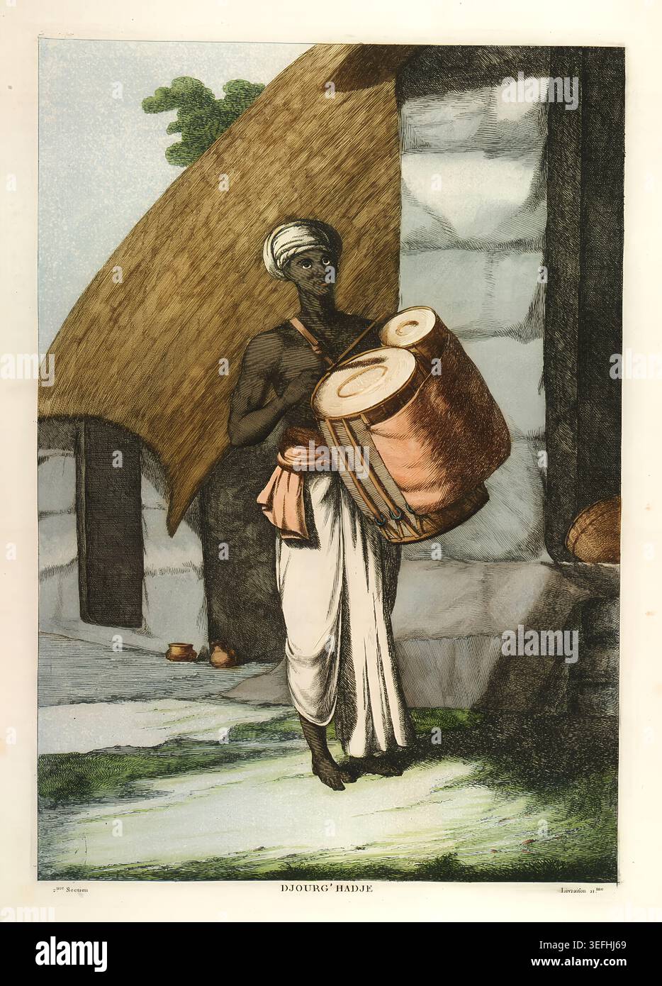 Indischer Straßenmusiker in Turban und Dhoti, der eine Dhol-Trommel spielt und traditionelle Volksmusik in einem handfarbenen Vintage-Gravur aufführt, der an das kulturelle Erbe und den Festivalrhythmus erinnert. Von Frans oder Francois Balthazar Solvyns (1760-1824) Stockfoto