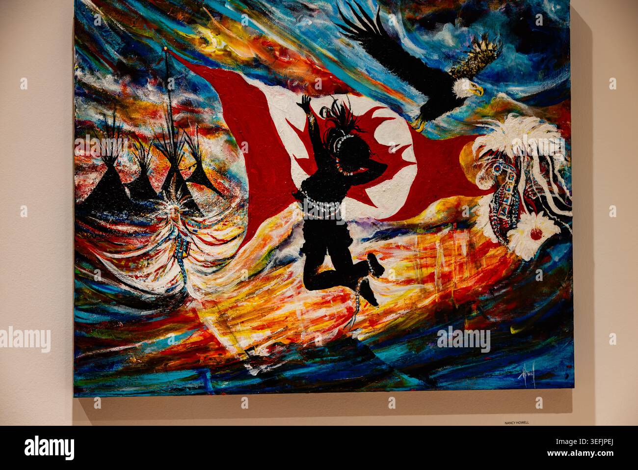 Farbenfrohe Gemälde mit Figuren, Tipi und Adler Stockfoto