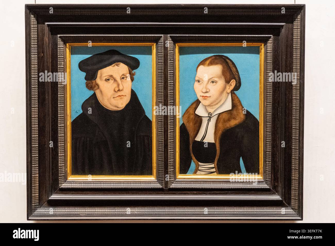 Florenz, Italien - 17. September 24: Gepaarte Renaissance-Porträtmalereien eines Mannes und einer Frau, die nebeneinander in den Uffizien in Flore ausgestellt werden Stockfoto