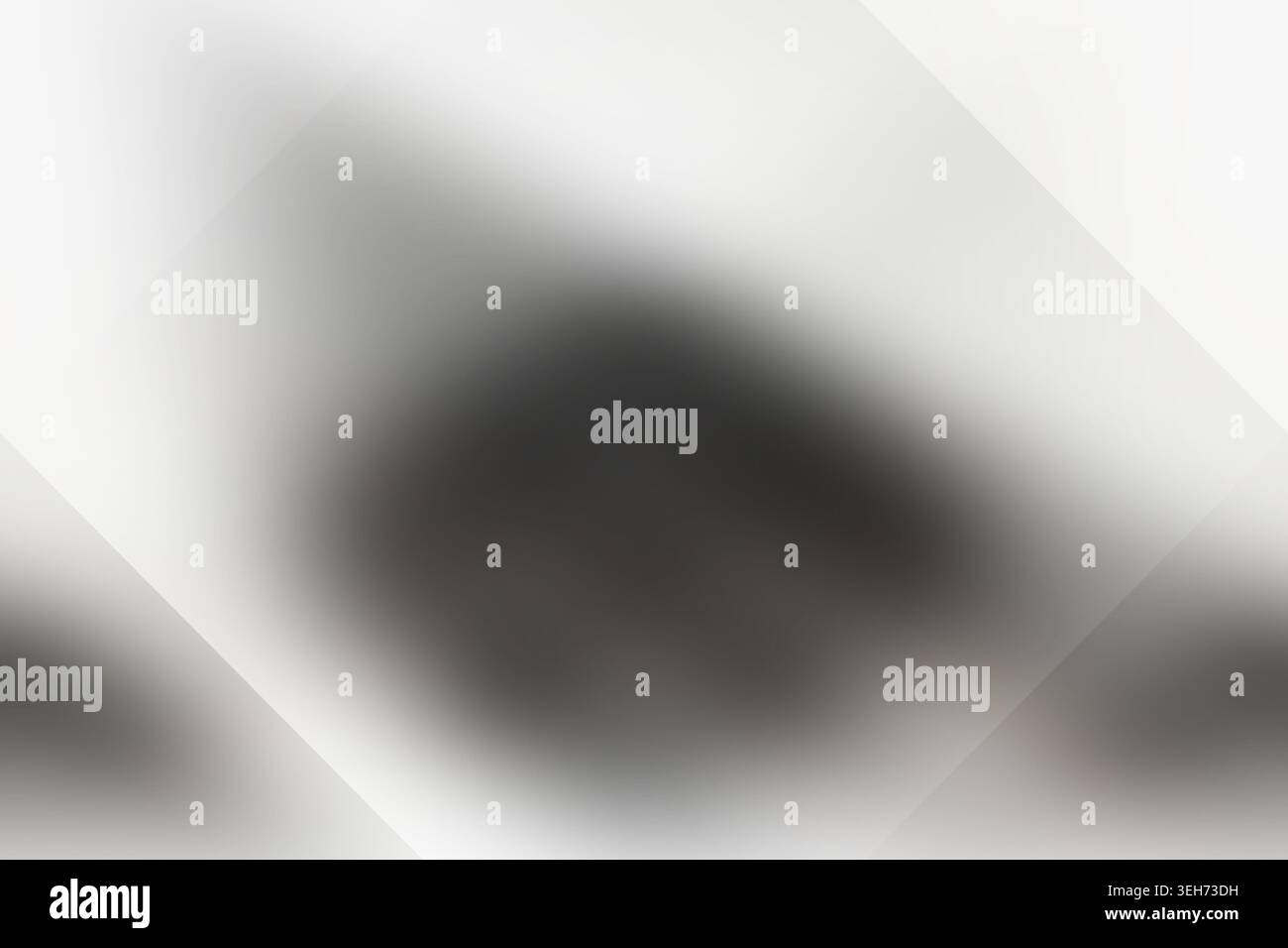 Ein abstrakter Hintergrund mit glatten, verschwommenen Verläufen und einer dezenten diamantförmigen Überlagerung, die eine weiche und moderne Ästhetik schafft. Stockfoto