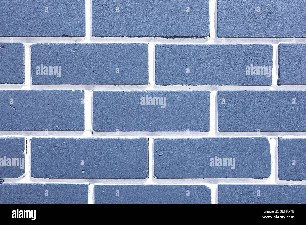 Blaue Backsteinwand Stockfoto