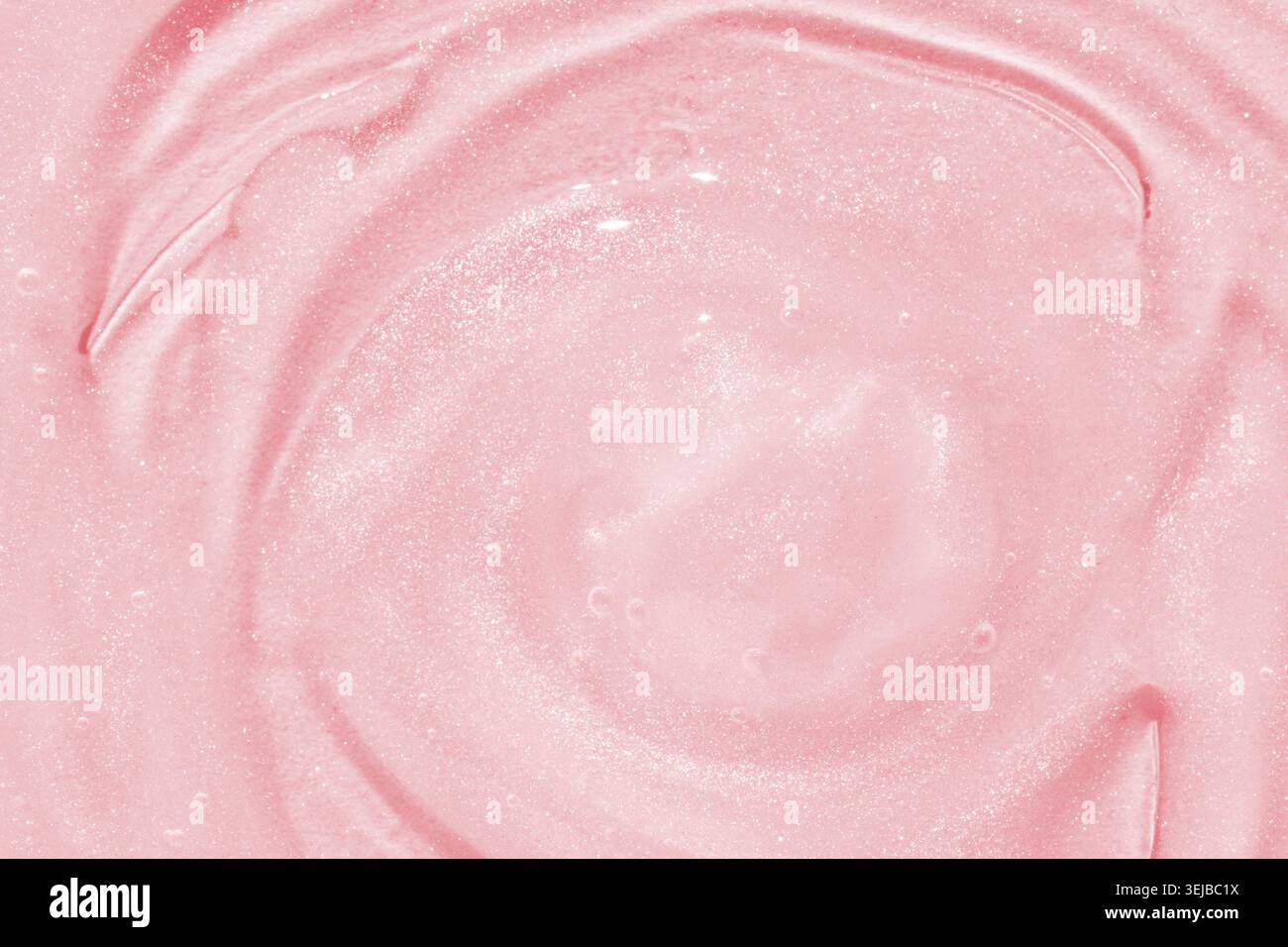 Funkelnd rosa, wirbelnde Textur mit glänzender Oberfläche für kreative Hintergründe und Designs Stockfoto
