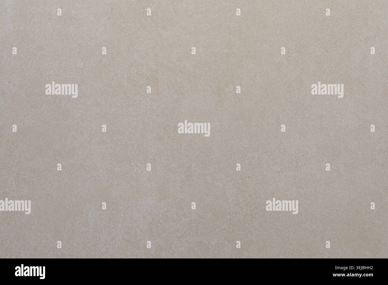 Ein glatter beigefarbener Hintergrund mit sanfter Textur sorgt für eine warme und einladende Atmosphäre. Perfekt für verschiedene kreative Anwendungen, z. B. Design, Druck oder Graben Stockfoto