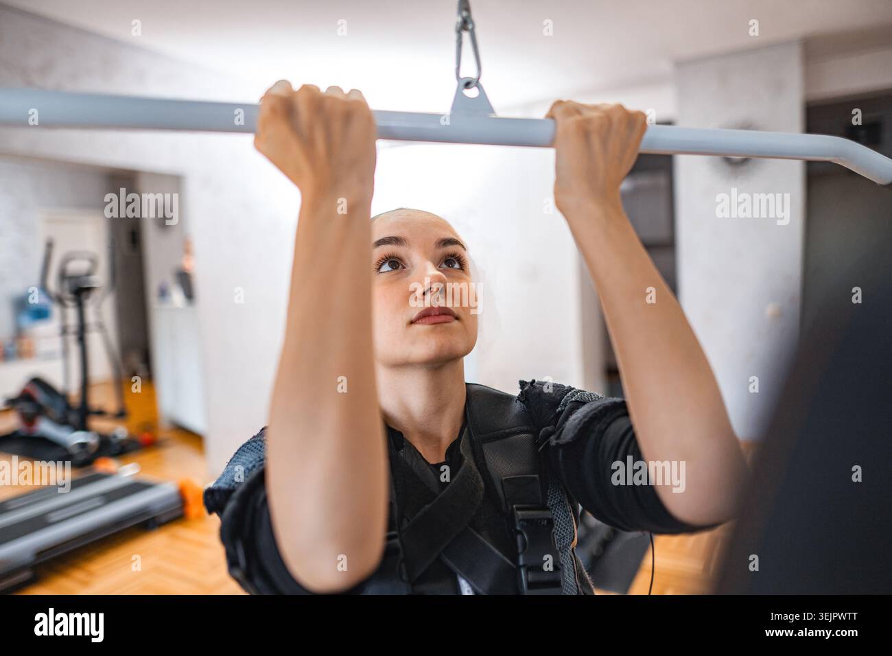 Heim-EMS: Innovative Workout-Technologie Stockfoto