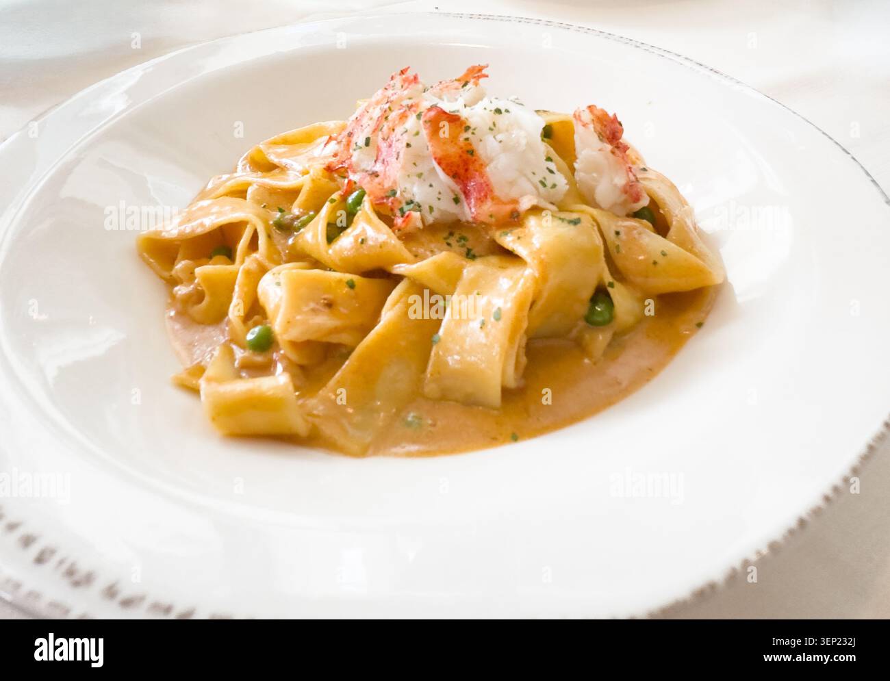 Hummer Linguini in einem italienischen Gourmetrestaurant Stockfoto