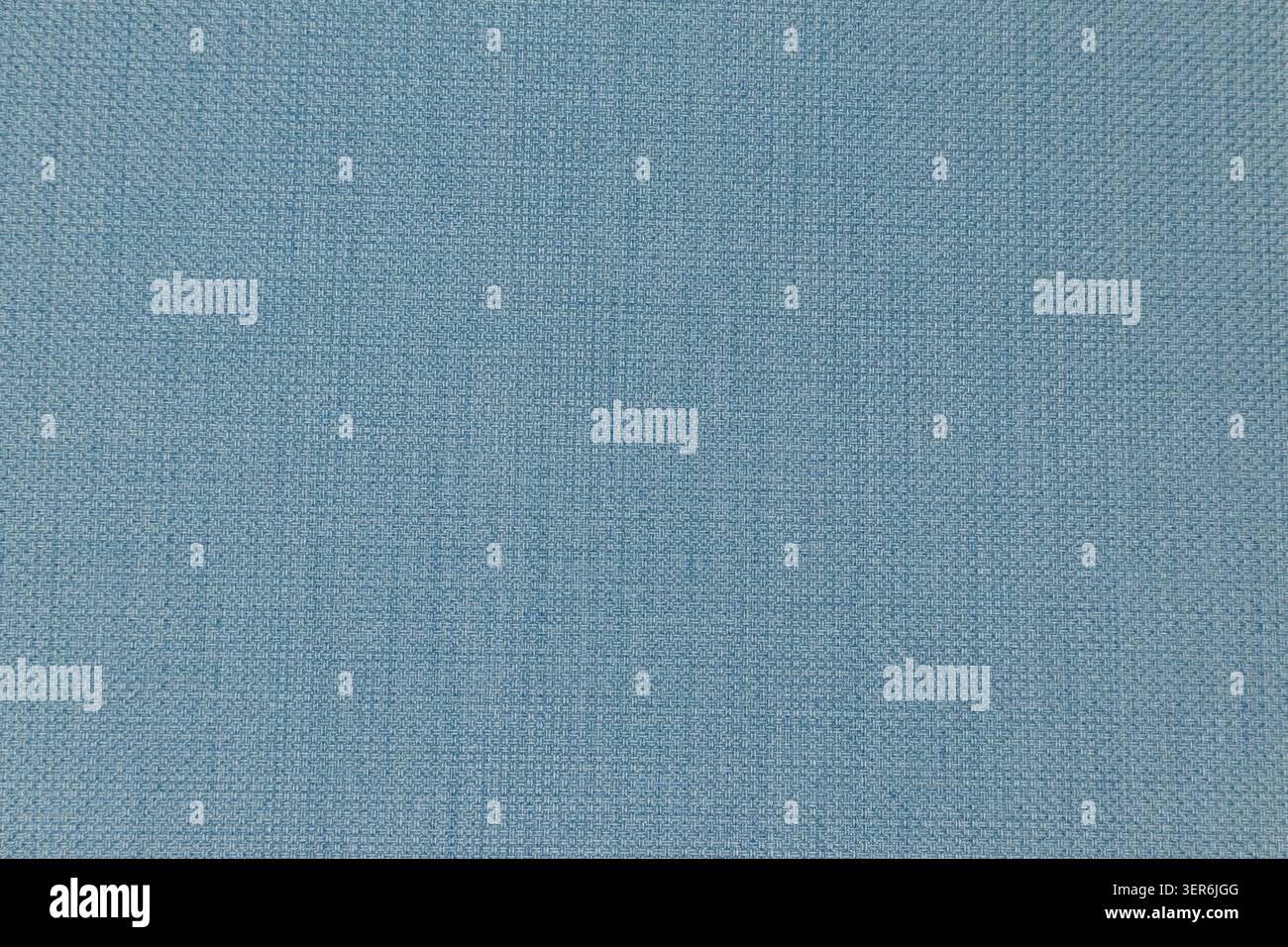 Eine gewebte Textiloberfläche aus blauem Gewebe Stockfoto