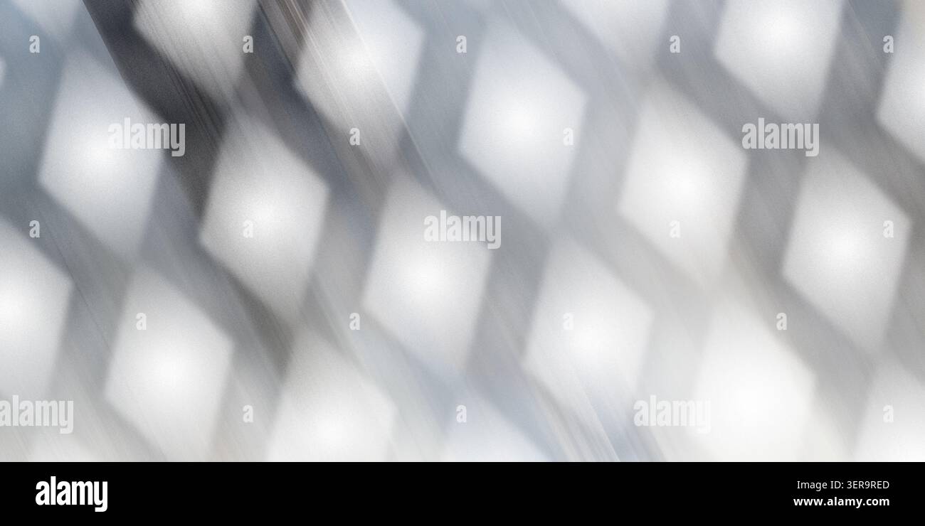 Ein abstrakter Hintergrund mit einem sich wiederholenden Muster aus leuchtenden, weichen Diamantformen mit dezenten grauen und silbernen Lichtstreifen. Stockfoto