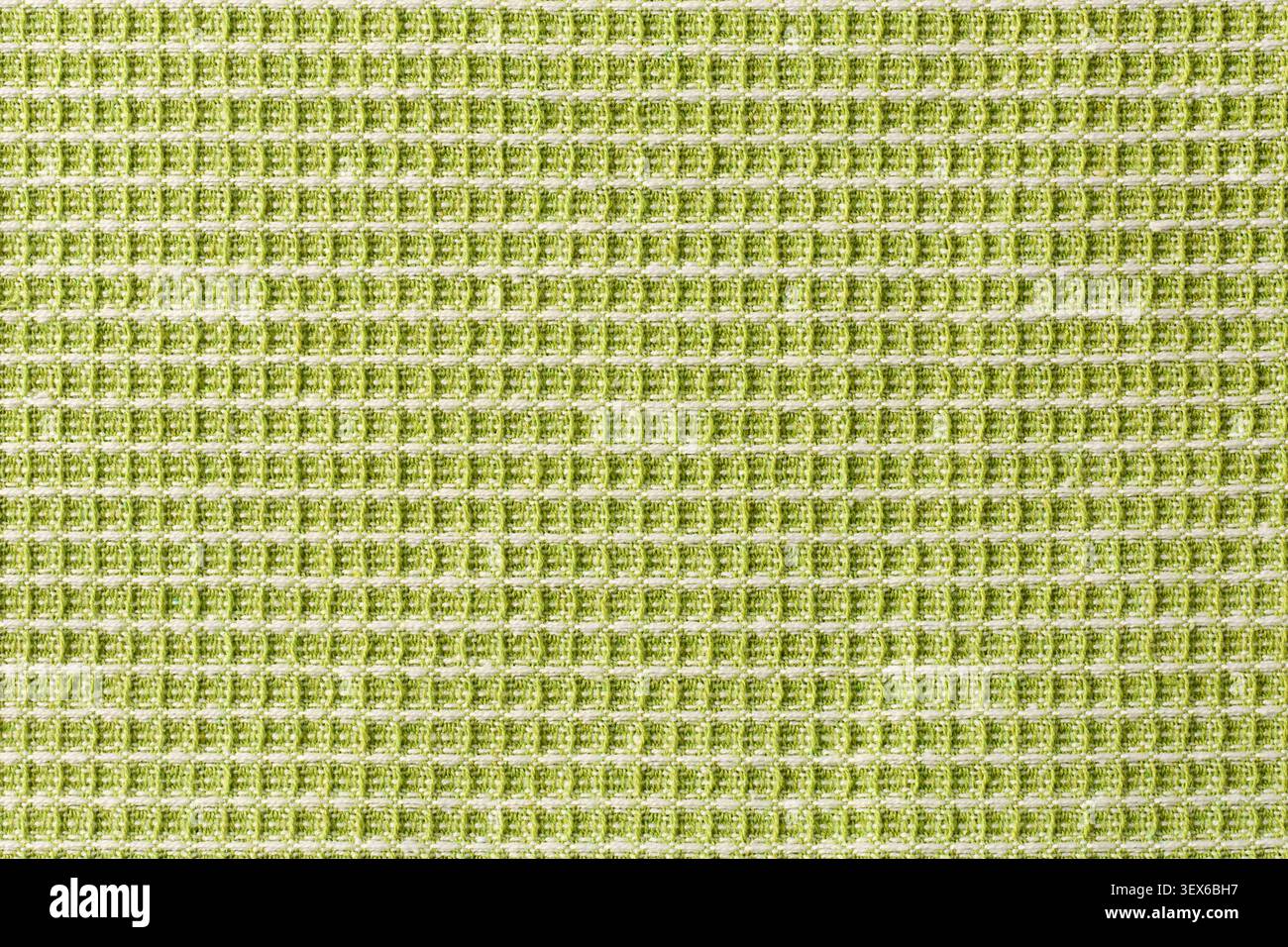Hellgrünes gewebtes Mehrzweck-Reinigungstuch Hintergrundtextur, weiches Mikrofasergewebe in Nahaufnahme mit Kopierraum, Haushaltshygiene Stockfoto