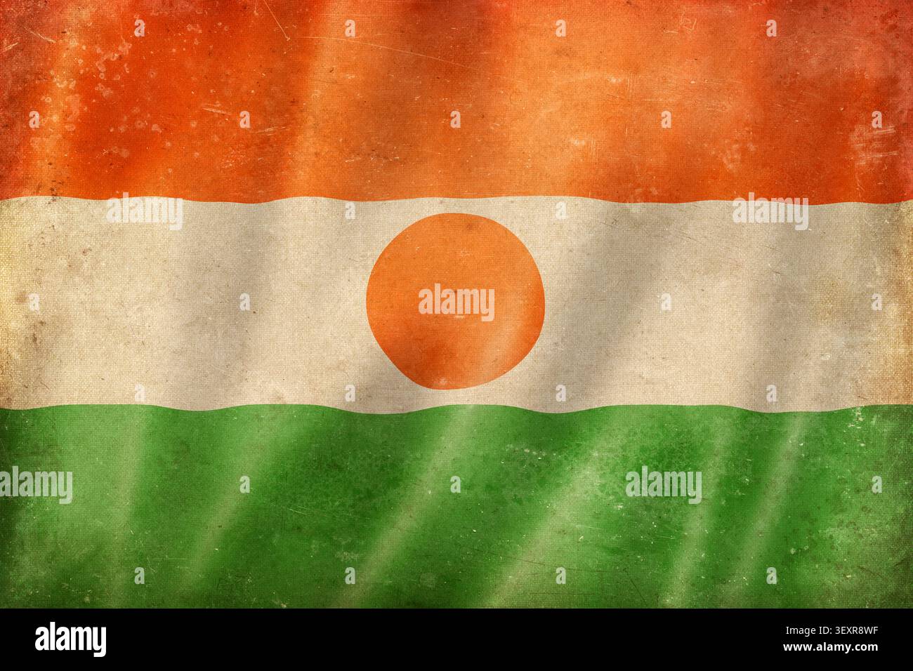 Alte, winkende Flagge Nigerias, abgenutzt, fleckig und zerknittert. Strukturierter canva-Hintergrund Stockfoto