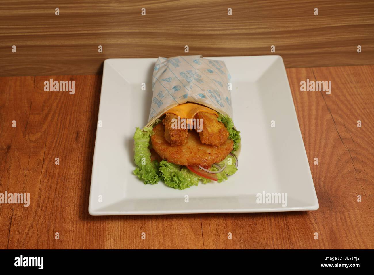 UN Mini Burger EST Servi sur une assiette. Stockfoto