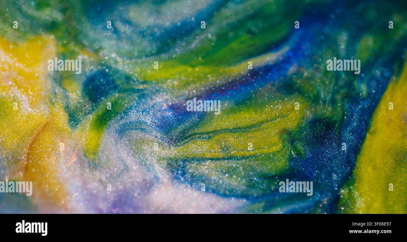 Farbstrom-Bokeh-Glitzertextur-Flecken-Flüssigkeit Stockfoto