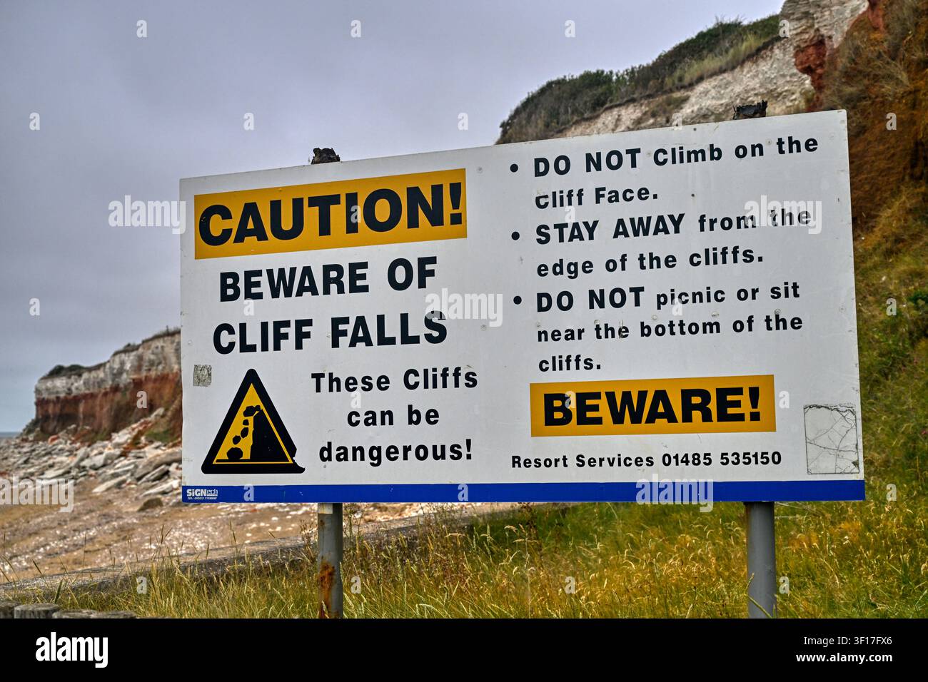 Warnschild Hunstanton-Klippen, Norfolk, UK Stockfoto