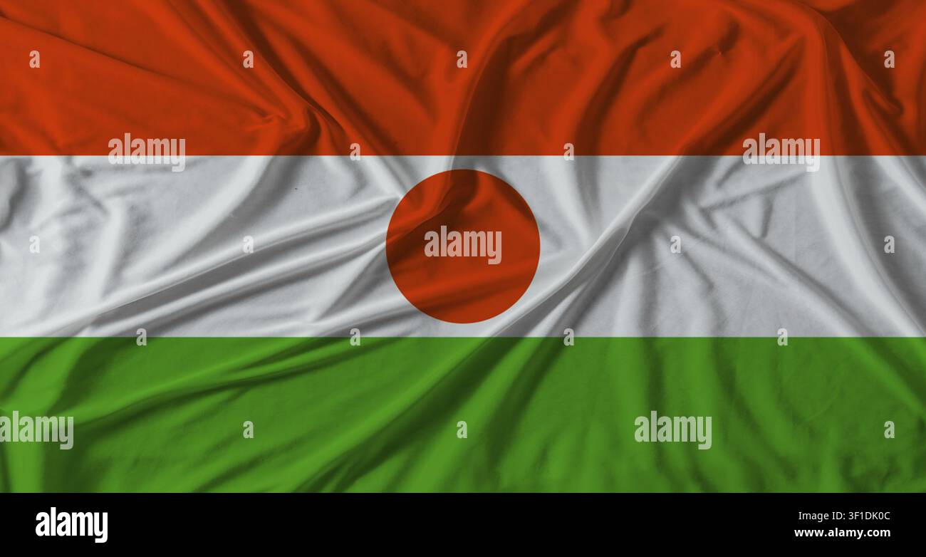 Niger-Flagge mit Stofftextur-Hintergrund. Nationale Flagge von Niger mit Stofftextur Stockfoto