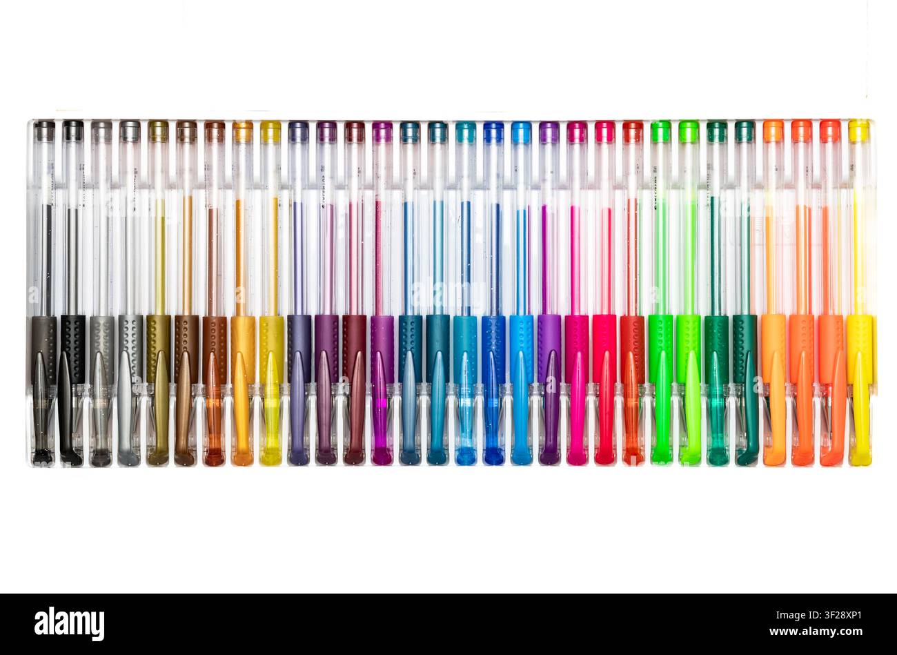 Großer Satz farbenfroher Gelstifte, die in Regenbogenfarbenfolge auf weißem Hintergrund angeordnet sind Stockfoto