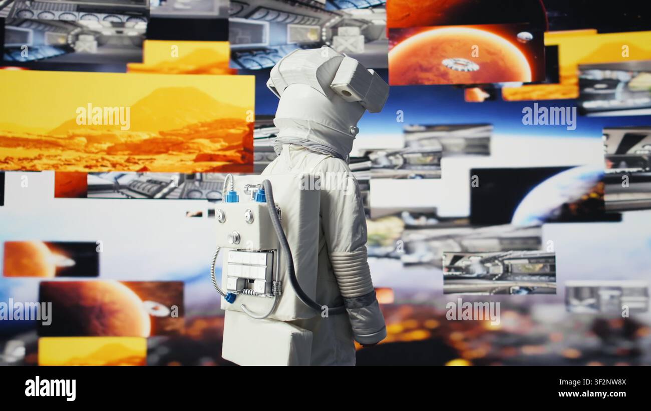 Junger männlicher Kosmonaut schwebt während eines Weltraumspaziergangs in der Nullschwerkraft und reflektiert interstellare Abenteuer, himmlische Wunder und die Zukunft der Astronautik und der planetaren Entdeckung. Raumschiff. Kamera B. Stockfoto