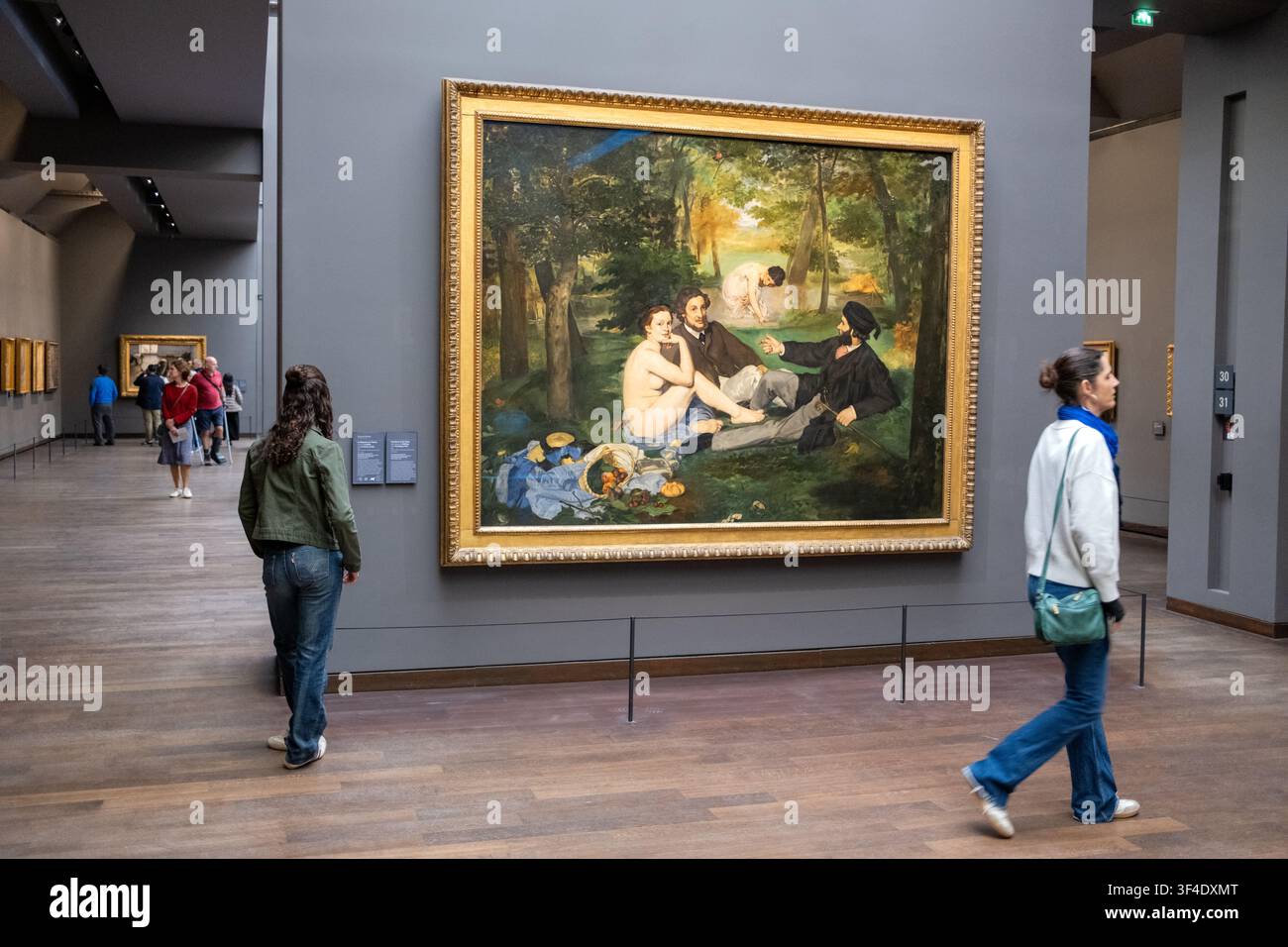 Le Dejeuner sur L'Herbe von Edouard Manet - Originales Kunstölgemälde im Musee D'Orsay in Paris, Frankreich Stockfoto