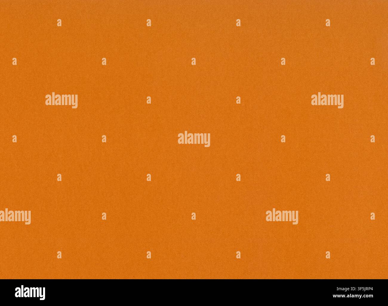 Dunkelorangefarbene Oberfläche aus dickem Papier oder Karton, Hintergrund, Textur. Hintergrund einer Papieroberfläche mit kleinem Muster. Terrakotta, hellbraune Abdeckung Stockfoto