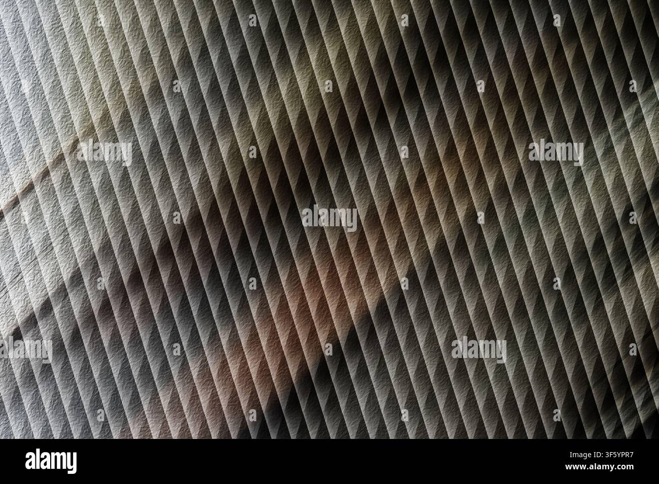 Eine abstrakte strukturierte Oberfläche mit einem sich wiederholenden diagonalen Muster, das einen sanften Farbverlauf von Licht und Schatten über das strukturierte Material aufweist. Stockfoto