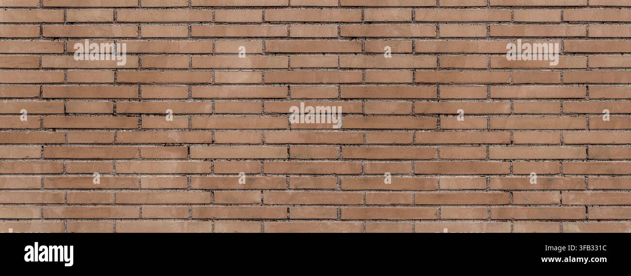 Braune Ziegelwand mit horizontalen rechteckigen Ziegeln und sichtbaren Mörtelfugen, die einen strukturierten Hintergrund erzeugen Stockfoto