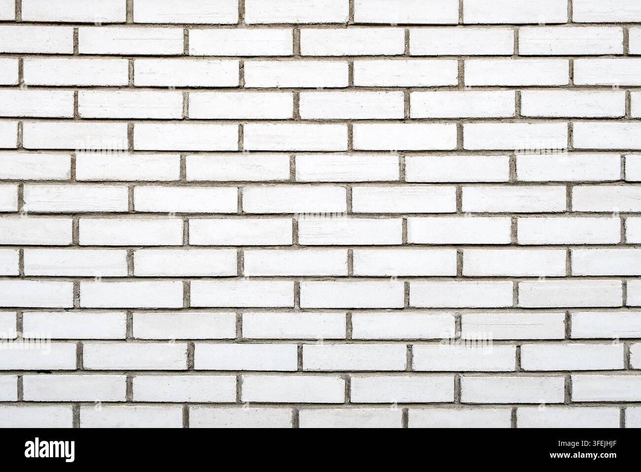 weißer Ziegelwandhintergrund Ziegelfugen Stockfoto