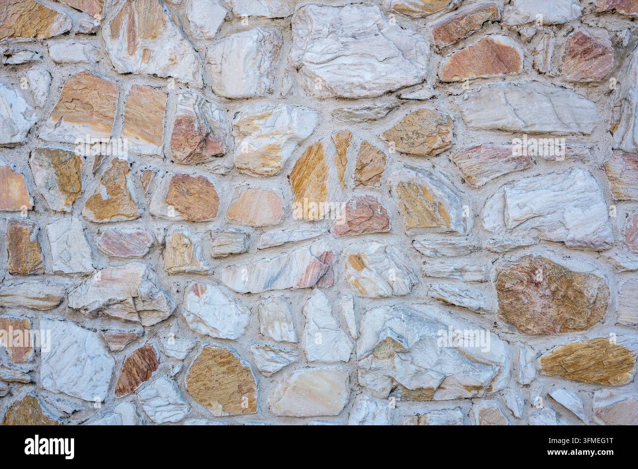 Hintergrund von eine alte Natursteinmauer Stockfoto
