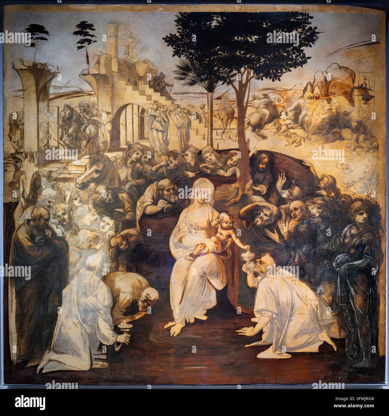 Italien, Toskana, Florenz, als Weltkulturerbe von der UNESCO gelistet, Galleria degli Uffizi (Uffizigalerie) Museum, Anbetung der Heiligen Drei Könige (ca. 1481–1482) von Leonardo da Vinci, Öl auf Holz, ein unvollendetes Werk aufgrund seiner Abreise nach Mailand Stockfoto