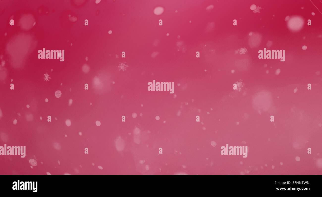 Minimalistische rosa Kulisse mit verstreuten Glitzerpartikeln. Stockfoto
