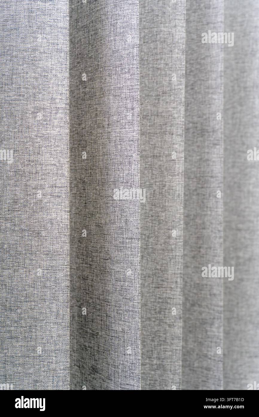 Vertikale graue Leinenvorhang-Textur-Hintergrund Stockfoto