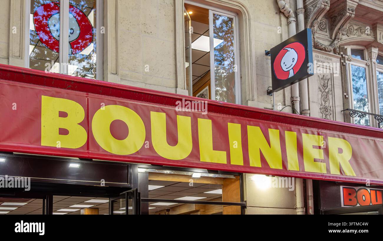 Schild und Logo des historischen Boulinier-Ladens am Boulevard Saint-Michel in Paris. Boulinier ist ein Antiquariat, das 1845 gegründet wurde Stockfoto