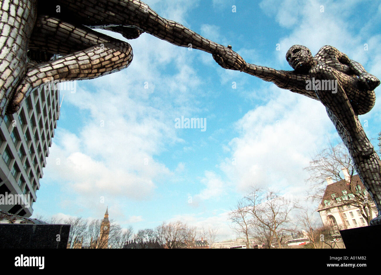 Handshake über Parlament London Stockfoto