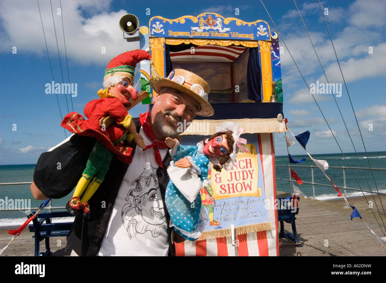Kasperletheater Professor, Aberystwyth Promenade, Sommernachmittag, Seaside Unterhaltung, Wales UK Stockfoto