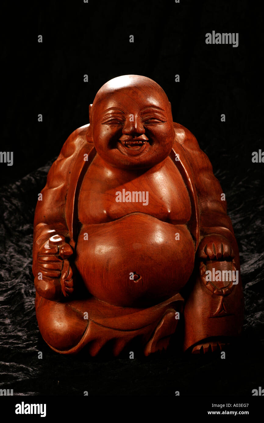 Eine lachende Buddha-Hand gemacht von Holz in Thailand Stockfoto