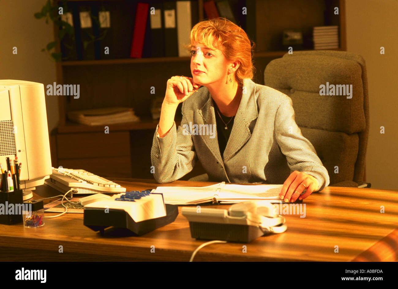 Geschäftsfrau im Büro Stockfoto