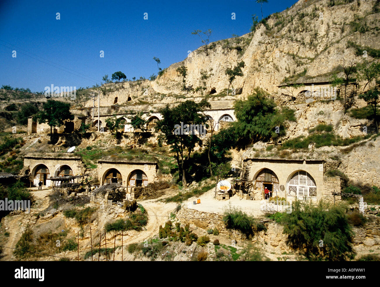 Shanxi, China - Höhlenwohnungen in den Löss-Boden von einer erodierten Hügel in der Nähe des gelben Flusses gegraben Stockfoto