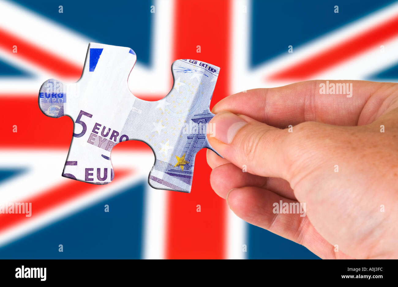 Puzzle des Euro und der Union Jack-Flagge Stockfoto